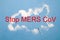 Red stop inscription coronavirus, MERS CoV blue background, country silhouette made of white powder, coronavirus epidemic concept,