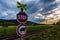 A red stop sign at the railroad crossing with no entry sign