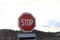 Red stop sign in traffic