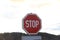 Red stop sign in traffic