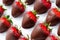 Red strawberries dipped in chocolate