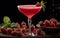 Red strawberry frozen martini cocktail on dark background