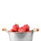 red strawberry in iron bucket on isolated white background