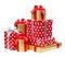 Red and striped and gold boxes with gifts tied bows on white
