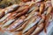 Red striped mullet fishes or Mullus surmuletus on ice for sale in the greek fish shop.