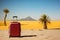 A red suitcase sitting on top of a desert sand. Two palms. Minimalist touristic concept