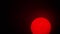 Red sun sphere in thick smog