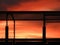 Red sunrise in an area of steel frame construction