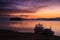 Red sunrise and boat