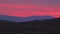 Red sunset over the tops of large sand dunes. Great Sand Dunes National park. COLORADO. USA