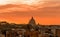 Red sunset on Rome. St Peter dome silhouette