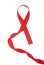 Red support ribbon on white background. World AIDS Day concept