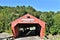 Red Taftsville Covered Bridge in the Taftsville Village in the Town of Woodstock, Windsor County, Vermont, United States