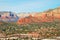 The red and tan, multi-layered rocks of the mountains of Sedona, Arizona