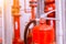 Red tank of fire extinguisher Overview of a powerful industrial fire extinguishing system