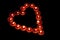 Red tealights in heart shape
