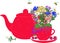 Red teapot and cup with herbs and berries
