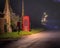 Red Telephone Box in the Cotswolds at night