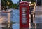 The red telephone box , famous icon of London, on Waterloo place