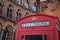 Red Telephone Box in London in front of St Pancras Hotel.