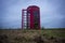 A red telephone box in the middle of nowhere