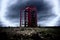 A red telephone box in the middle of nowhere