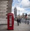 Red telephone box public telephone and big ben and parliament london