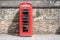 The red telephone box, a telephone kiosk for a public telephone is a familiar sight on the streets of the United Kingdom, Malta,