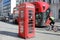 A red telephone box on Waterloo Place, central London