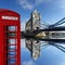 Red telephone boxes with Tower Bridge in London, U