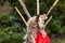 Red textile and animal on teepee structure