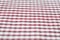Red textile gingham cotton background