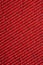 Red textural fabric, pattern on diagonal