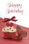 Red theme cupcake with butterfly on red and white background with Happy Saturday sample text