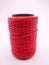 Red thread on white background. Roll red rope. fashion designer tools