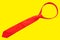 Red tie isolated on yellow background