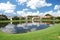 Red tile stucco homes around a small lake in Sarasota, Florida