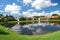 Red tile stucco homes around a small lake in Sarasota, Florida