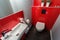 Red tiles in contemporary toilet
