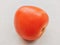 Red tomato fruit single tomato vegetable tomat timatar pomidor tomate closeup view image photo