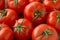 Red tomatoes background