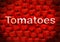 Red tomatoes background with tomatoes text tomato background