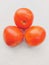 Red tomatoes fruit tomato vegetable tomat timatar pomidor tomate closeup view image photo