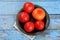 Red tomatoes are prepared for blanching