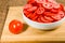 Red tomatoes sliced in a bowl