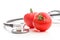 Red tomatoes and stethoscope.