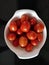 Red tomatoes used in salad dishes and drinks fruit berry vegetable