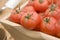 Red Tomatoes In A Wooden Trug