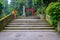 Red Tori Gate at Fushimi Inari Shrine, with stoned stairs located in Kyoto, Japan