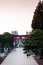 Red Torii gate at Morioka Hachimangu Shrine in Iwate at sunset with warm tone sky